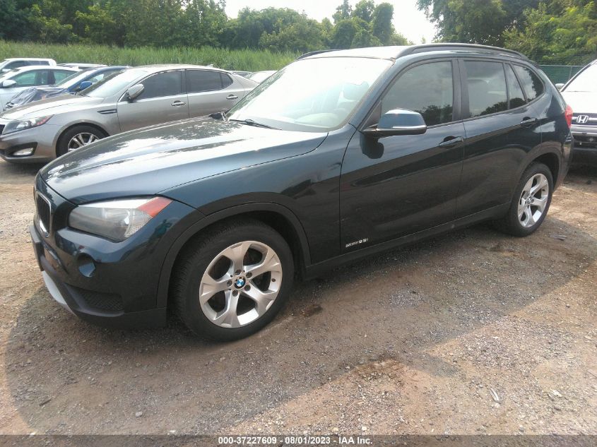 Photo 1 VIN: WBAVM1C55EVW54524 - BMW X1 