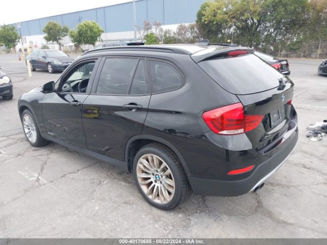 Photo 2 VIN: WBAVM1C55FV315702 - BMW X1 