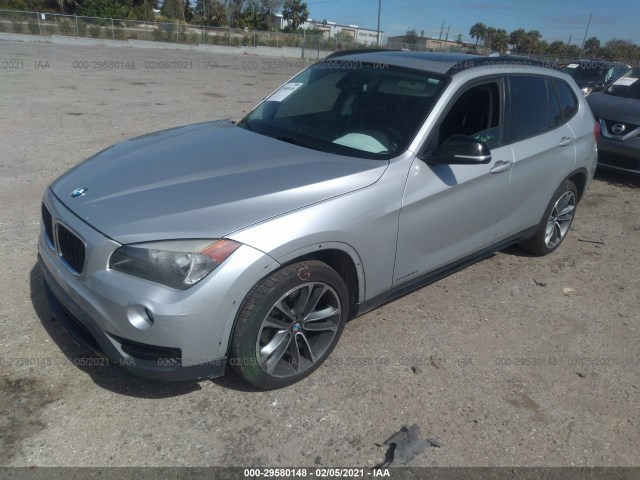 Photo 1 VIN: WBAVM1C55FV316929 - BMW X1 