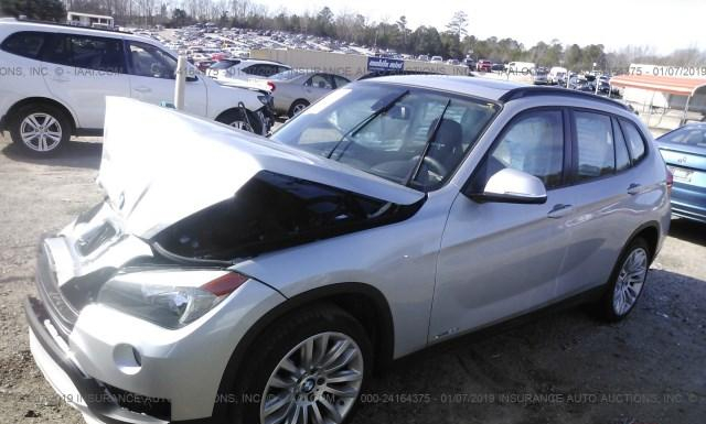 Photo 1 VIN: WBAVM1C55FVZ94385 - BMW X1 