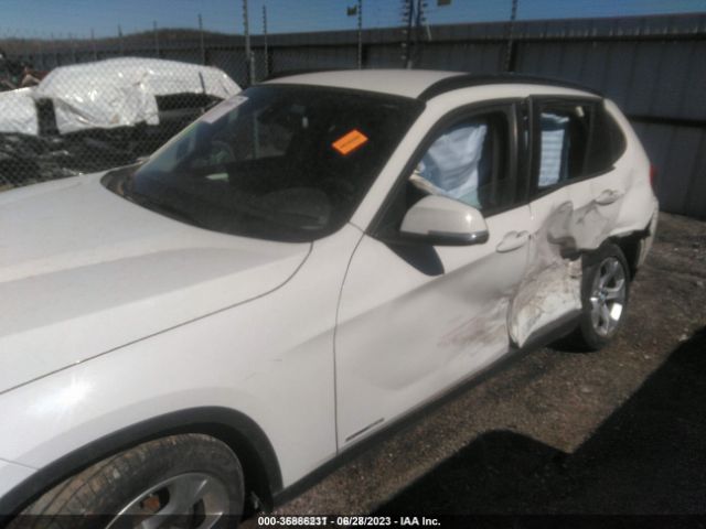 Photo 5 VIN: WBAVM1C56EVW47372 - BMW X1 