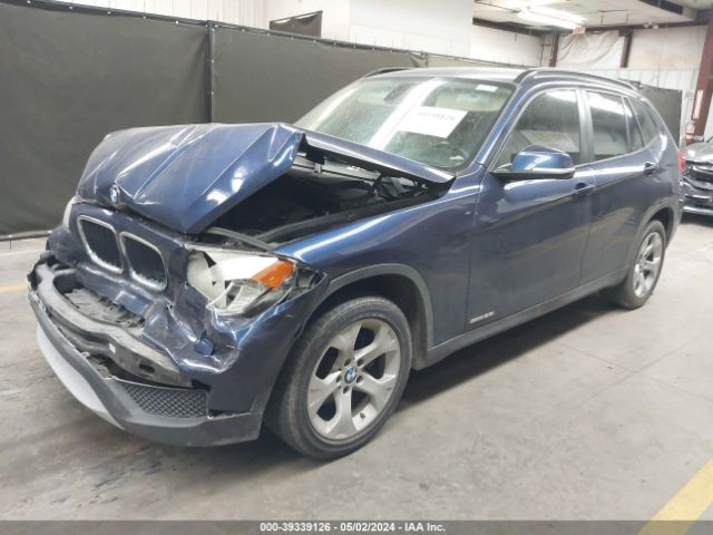 Photo 1 VIN: WBAVM1C56EVW55990 - BMW X1 