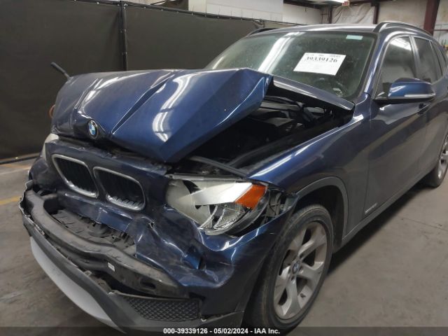 Photo 5 VIN: WBAVM1C56EVW55990 - BMW X1 