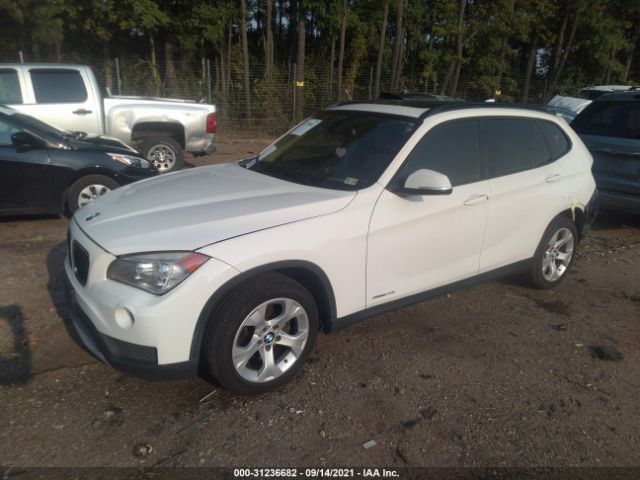 Photo 1 VIN: WBAVM1C56EVW56573 - BMW X1 