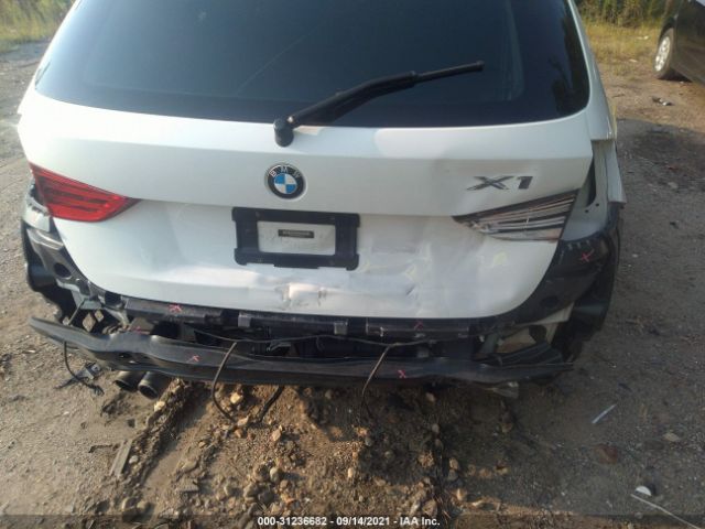 Photo 5 VIN: WBAVM1C56EVW56573 - BMW X1 