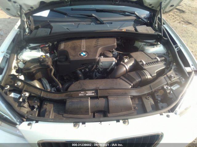 Photo 9 VIN: WBAVM1C56EVW56573 - BMW X1 