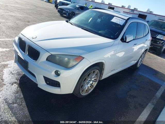 Photo 1 VIN: WBAVM1C57EVW47915 - BMW X1 