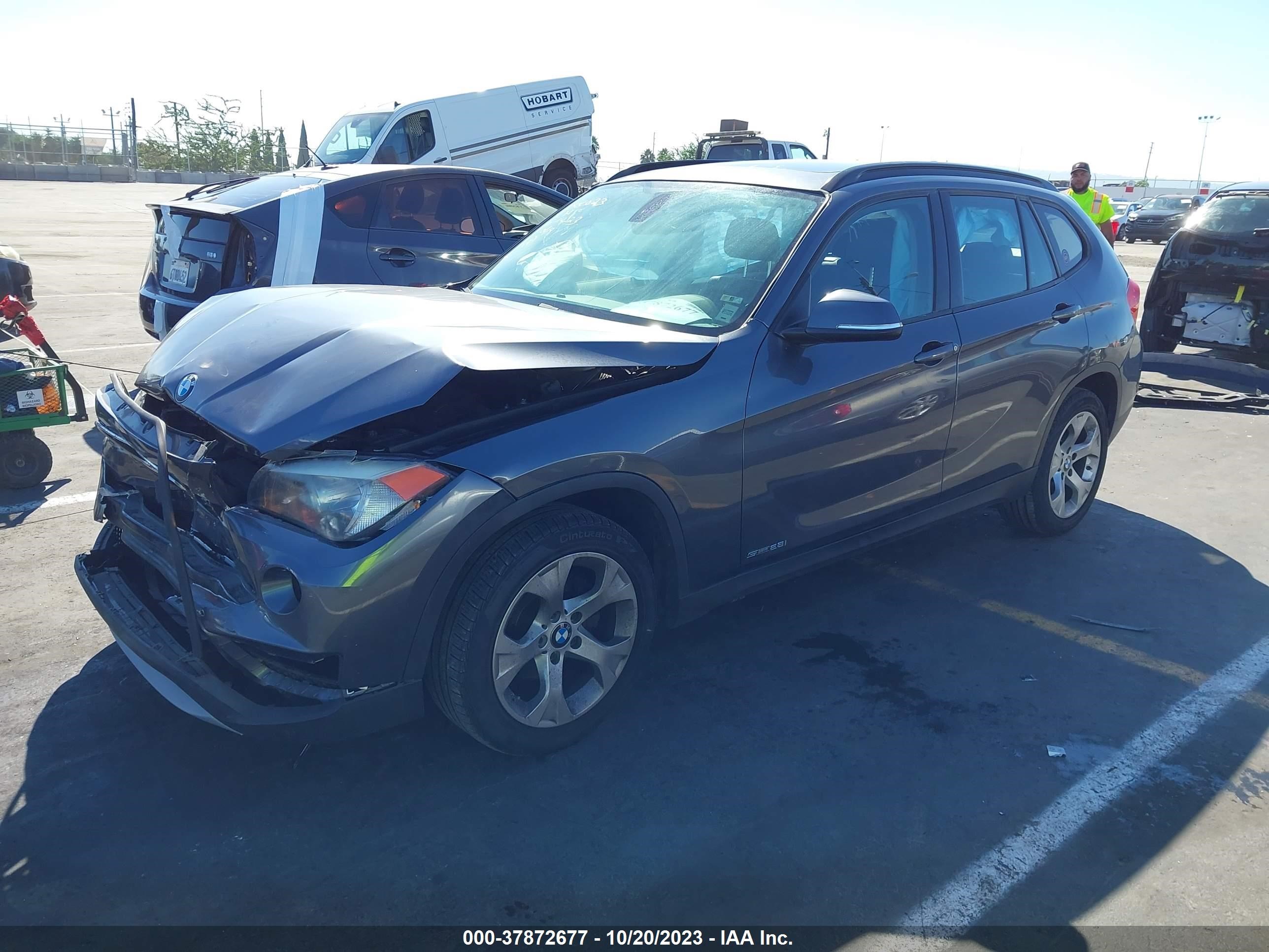 Photo 1 VIN: WBAVM1C57EVW48160 - BMW X1 