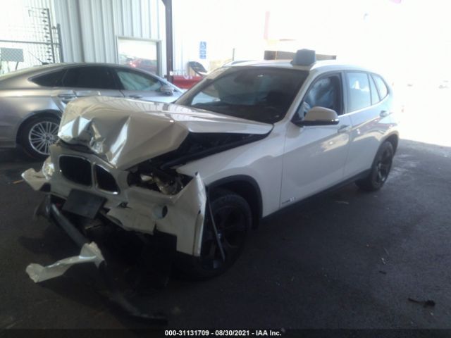 Photo 1 VIN: WBAVM1C57EVW48479 - BMW X1 