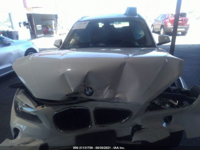 Photo 9 VIN: WBAVM1C57EVW48479 - BMW X1 