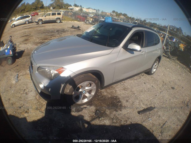 Photo 1 VIN: WBAVM1C57EVW48840 - BMW X1 