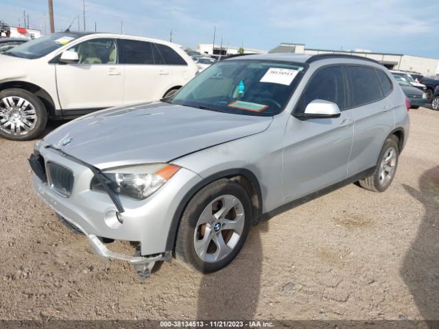 Photo 1 VIN: WBAVM1C57EVW49468 - BMW X1 