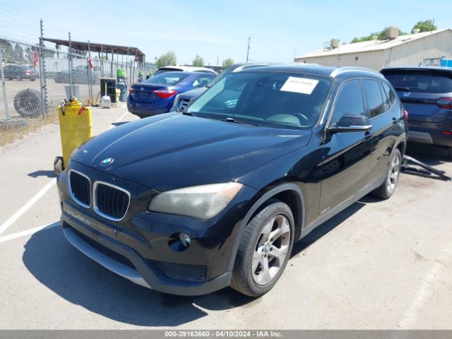 Photo 1 VIN: WBAVM1C57EVW52693 - BMW X1 