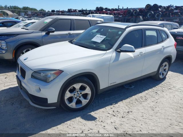 Photo 1 VIN: WBAVM1C57FV314342 - BMW X1 