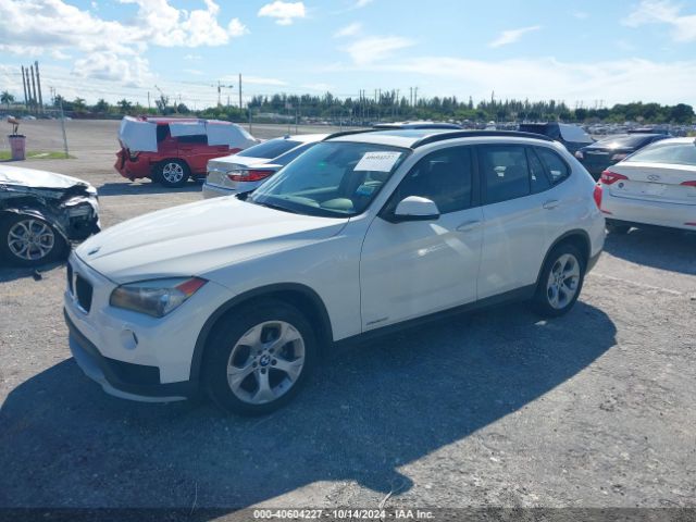 Photo 1 VIN: WBAVM1C57FV319489 - BMW X1 