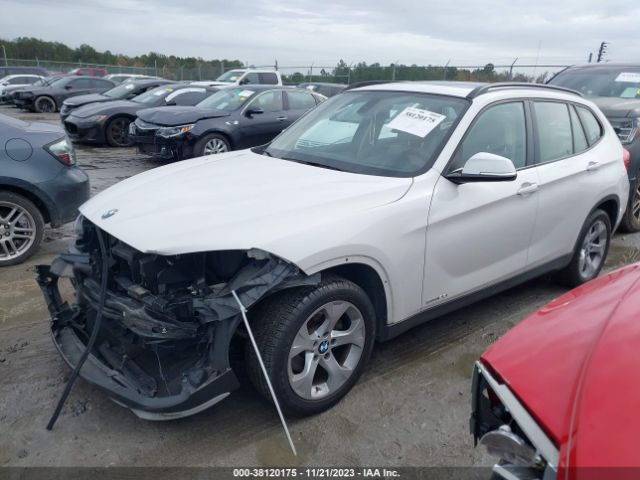 Photo 1 VIN: WBAVM1C57FV498200 - BMW X1 