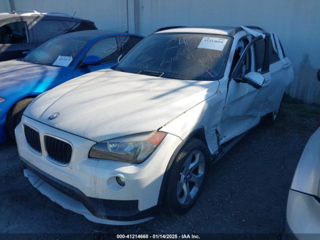 Photo 1 VIN: WBAVM1C57FVW57099 - BMW X1 