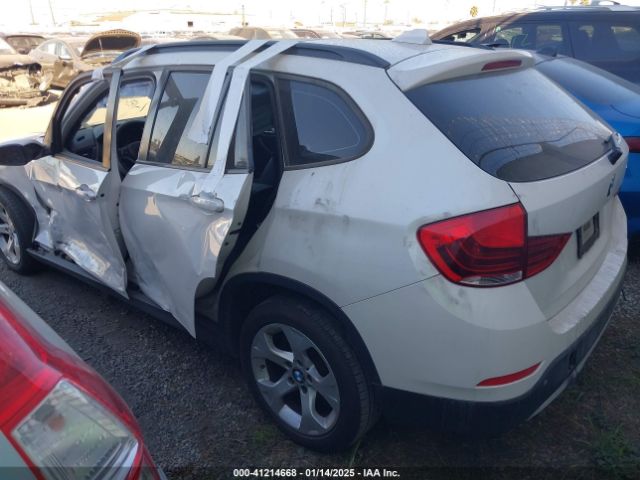 Photo 2 VIN: WBAVM1C57FVW57099 - BMW X1 