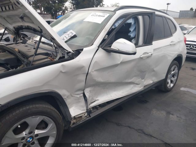 Photo 5 VIN: WBAVM1C57FVW57099 - BMW X1 