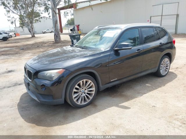 Photo 1 VIN: WBAVM1C58EVW52475 - BMW X1 