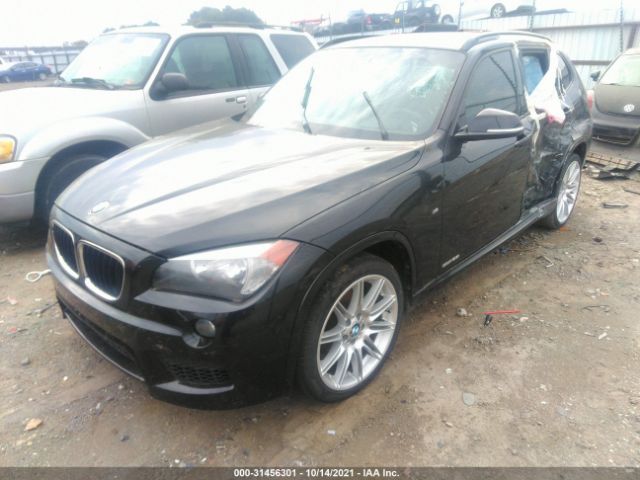 Photo 1 VIN: WBAVM1C58EVW54596 - BMW X1 