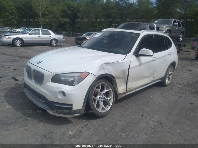 Photo 1 VIN: WBAVM1C58FVZ93652 - BMW X1 