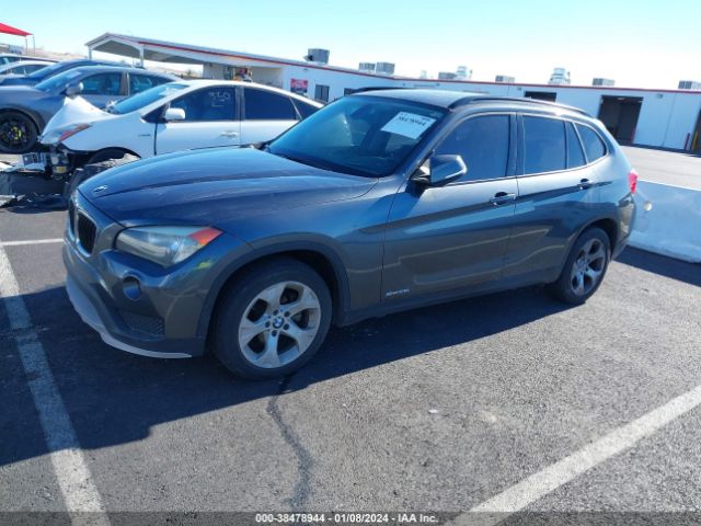 Photo 1 VIN: WBAVM1C59FV319106 - BMW X1 