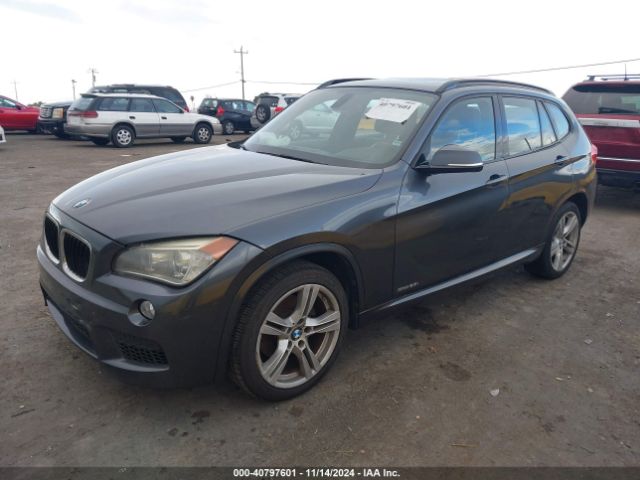 Photo 1 VIN: WBAVM1C59FVC14777 - BMW X1 