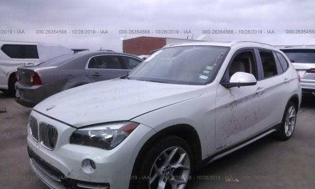 Photo 1 VIN: WBAVM1C59FVZ94311 - BMW X1 