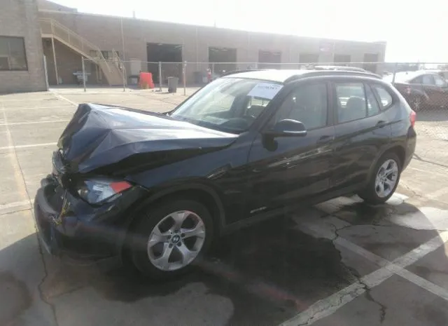 Photo 1 VIN: WBAVM1C5XEVW48699 - BMW X1 