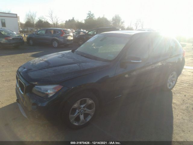 Photo 1 VIN: WBAVM1C5XEVW49724 - BMW X1 