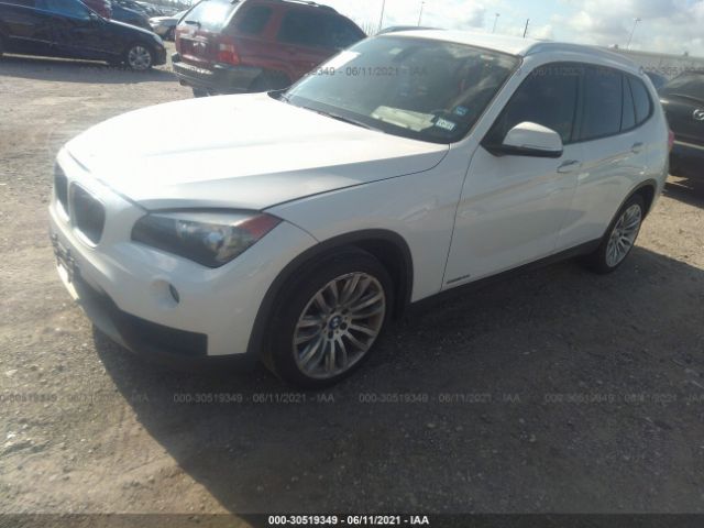 Photo 1 VIN: WBAVM1C5XEVW52512 - BMW X1 