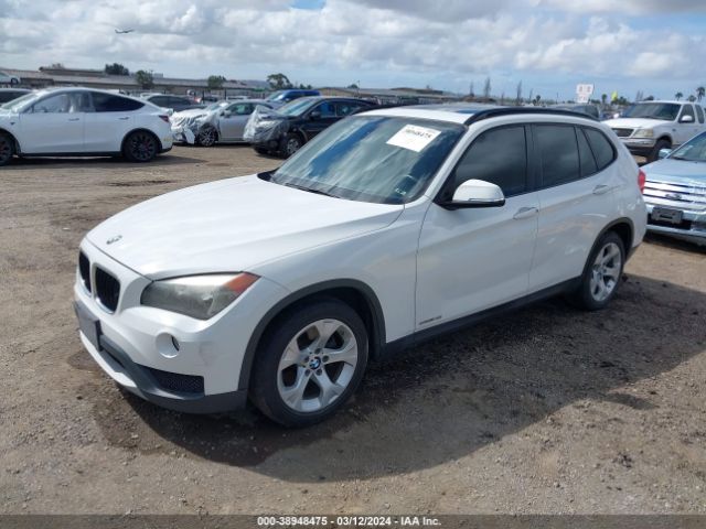 Photo 1 VIN: WBAVM1C5XEVW54020 - BMW X1 