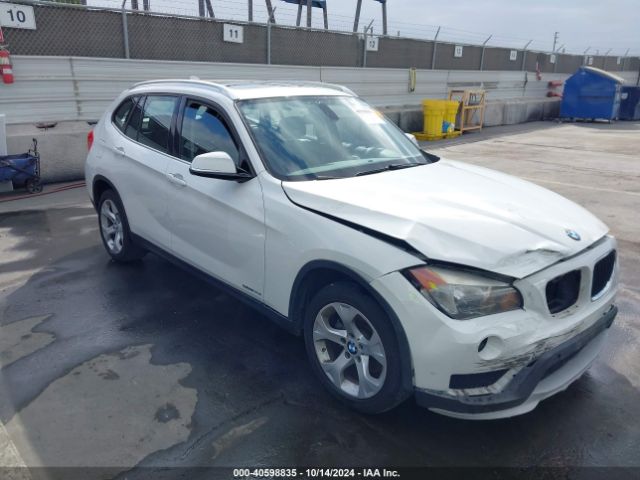 Photo 0 VIN: WBAVM1C5XFVW57999 - BMW X1 