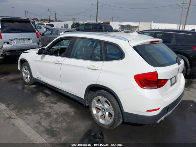 Photo 2 VIN: WBAVM1C5XFVW57999 - BMW X1 