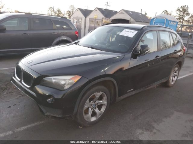 Photo 1 VIN: WBAVM1C5XFVW58005 - BMW X1 