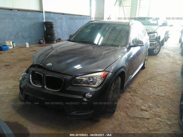 Photo 1 VIN: WBAVM5C52EVV93026 - BMW X1 