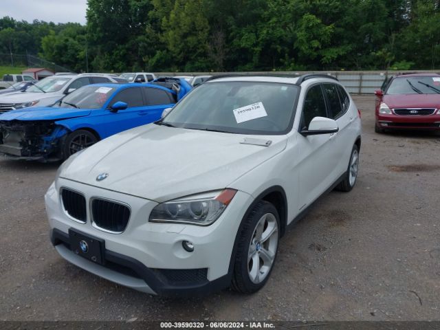 Photo 1 VIN: WBAVM5C53EVV92967 - BMW X1 