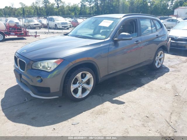 Photo 1 VIN: WBAVM5C53FVV94977 - BMW X1 