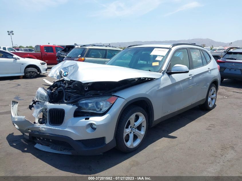 Photo 1 VIN: WBAVM5C54EVV93254 - BMW X1 