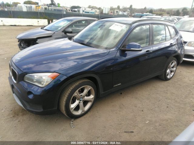 Photo 1 VIN: WBAVM5C55EVV92873 - BMW X1 