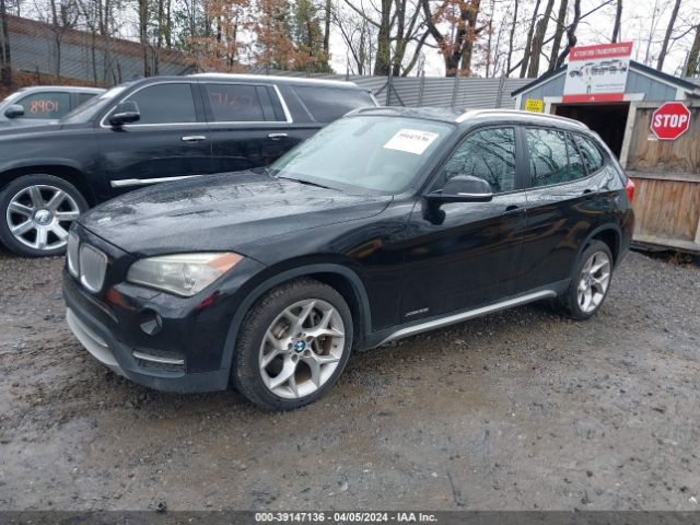 Photo 1 VIN: WBAVM5C56EVV91666 - BMW X1 