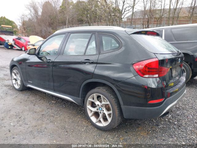 Photo 2 VIN: WBAVM5C56EVV91666 - BMW X1 