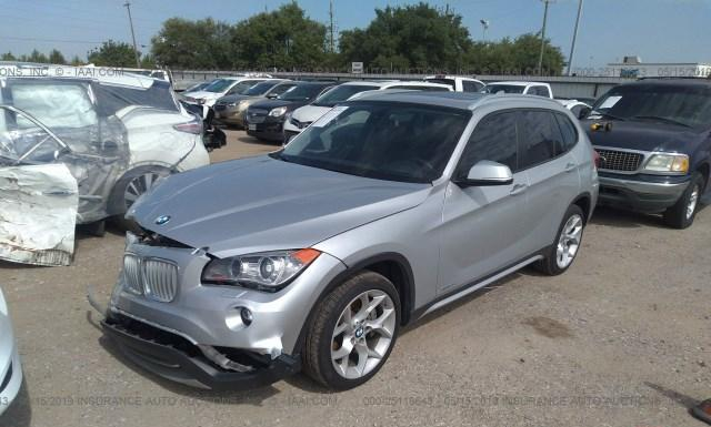 Photo 1 VIN: WBAVM5C57EVV91661 - BMW X1 