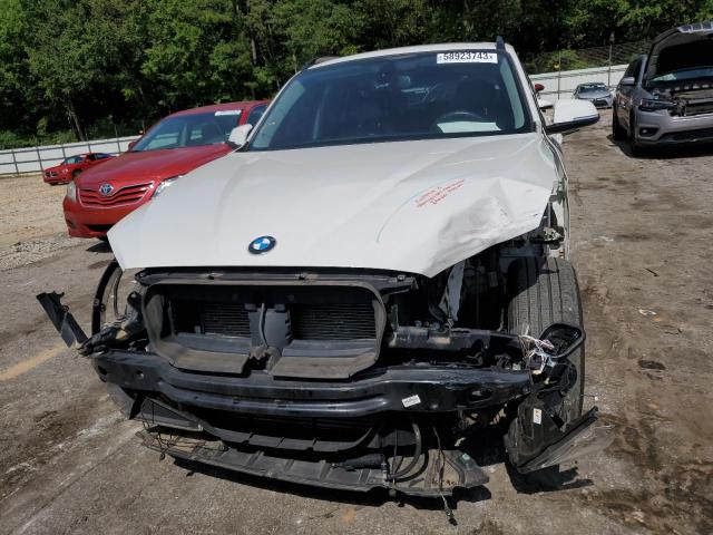 Photo 4 VIN: WBAVM5C58FVV94599 - BMW X1 