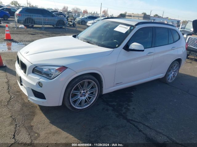 Photo 1 VIN: WBAVM5C59FVV93767 - BMW X1 