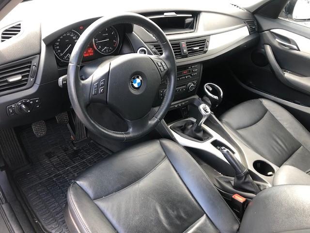 Photo 12 VIN: WBAVP11000VU03112 - BMW X1 SUV 