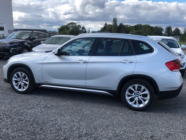 Photo 2 VIN: WBAVP11000VU03112 - BMW X1 SUV 