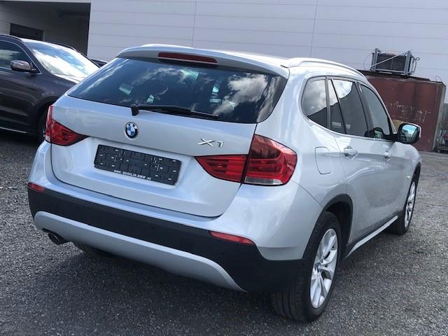 Photo 4 VIN: WBAVP11000VU03112 - BMW X1 SUV 