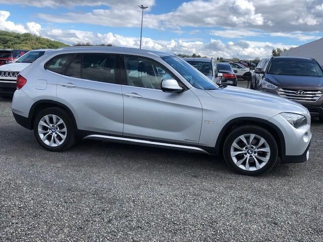 Photo 5 VIN: WBAVP11000VU03112 - BMW X1 SUV 